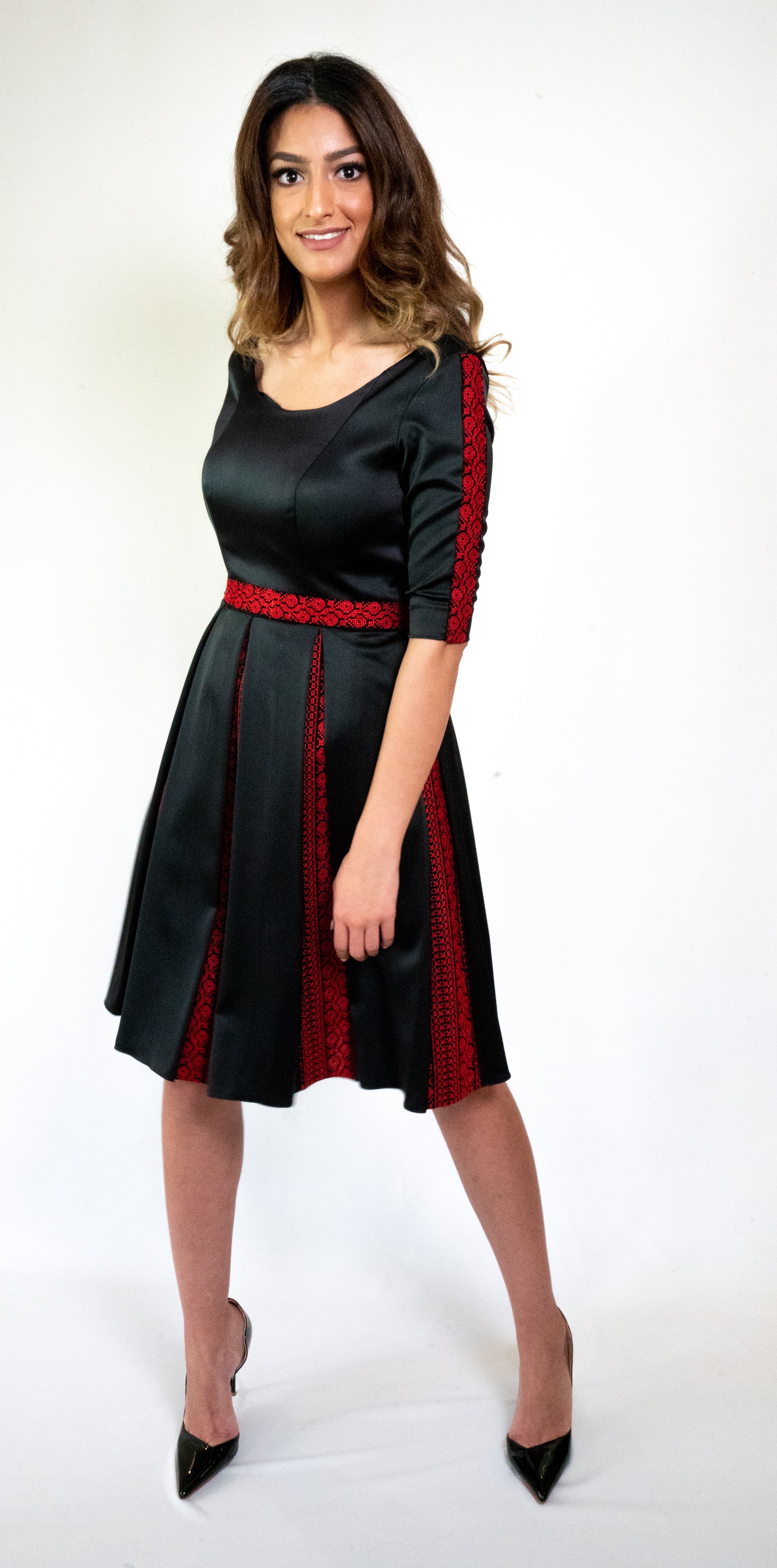 Chic Sophistication: Inverted Pleat Black Dress with Embroidered Waistband Black with Red Embroidery